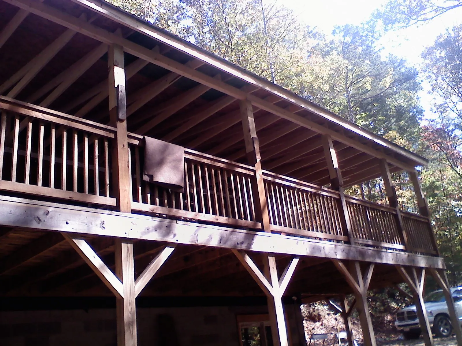 Timber framing under a new elevated porch and deck — Roof Leak Repair in Helenville by Roofing Brothers